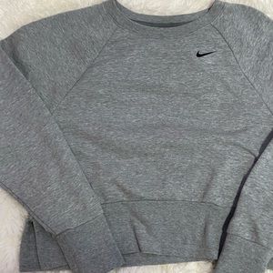 Grey cropped Nike crewneck with Nike lettering rubber and slits in back and side